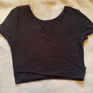 Black crossover baby tee